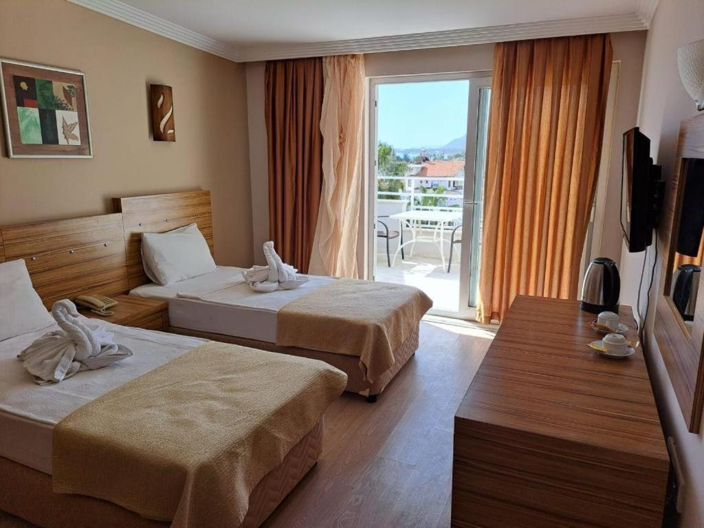 Chambre Double ou Lits Jumeaux - Vue Latérale sur Mer